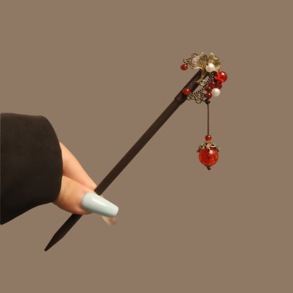 Bâtonnet pour cheveux en bois d’ébène avec motif floral