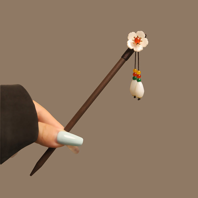 Bâtonnet pour cheveux en bois d’ébène avec motif floral