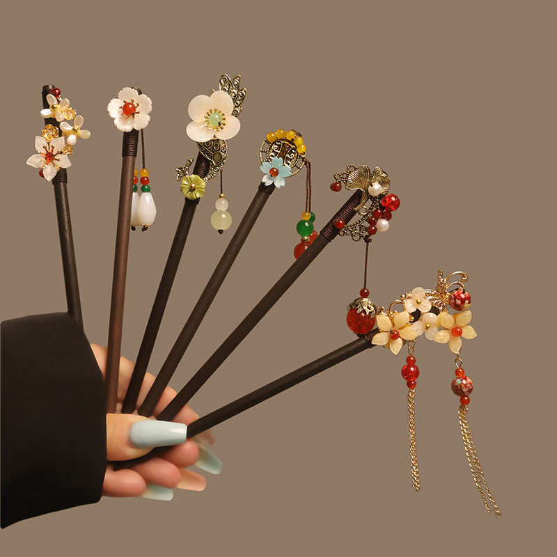 Bâtonnet pour cheveux en bois d’ébène avec motif floral