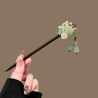 Varilla de madera para el cabello con flores y borla
