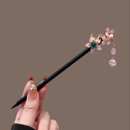 Varilla de madera para el cabello con flores y borla