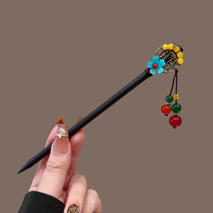 Varilla de madera para el cabello con flores y borla